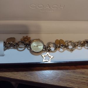 Coach watch  gold with box and book instructions